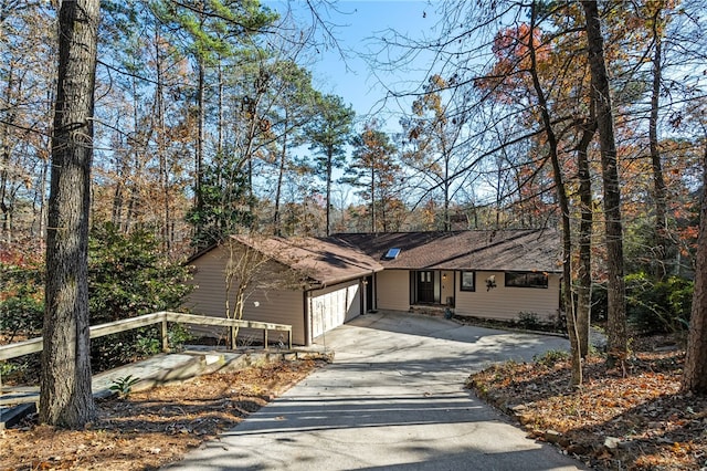 view of front facade featuring an attached garage and driveway