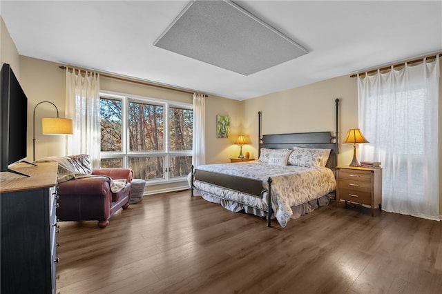 bedroom with wood finished floors