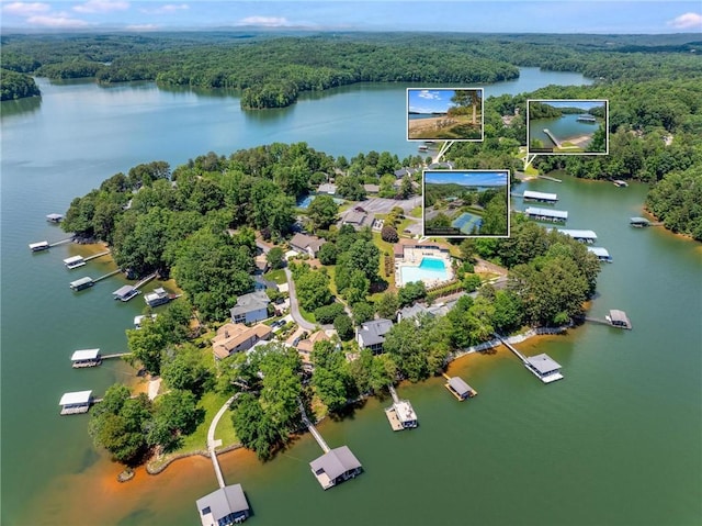 aerial view featuring a view of trees and a water view