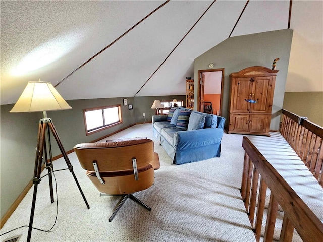 carpeted living room featuring lofted ceiling, visible vents, baseboards, and a textured ceiling