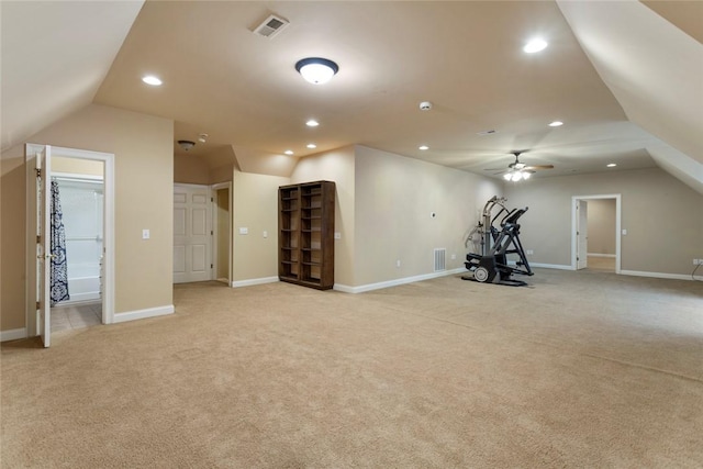 workout room with visible vents, light carpet, recessed lighting, baseboards, and lofted ceiling