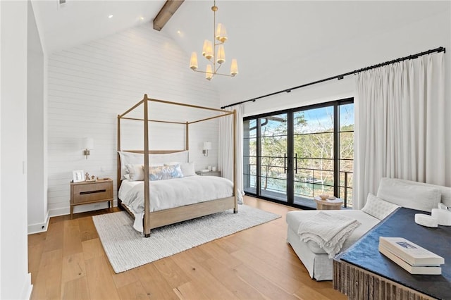 bedroom featuring high vaulted ceiling, beam ceiling, light wood-style flooring, access to exterior, and a chandelier