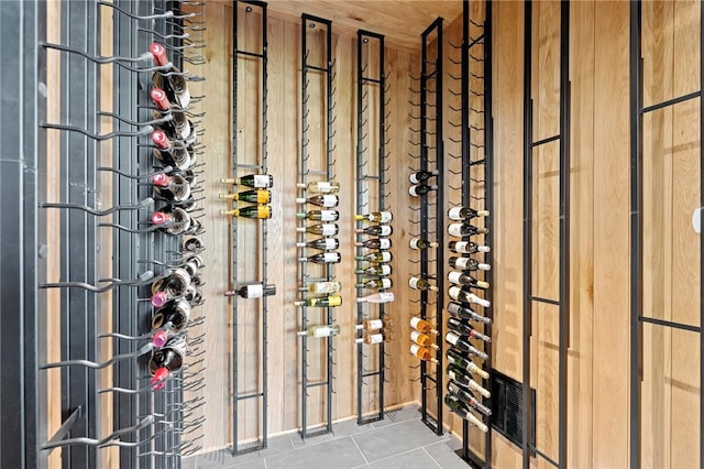 wine area with tile patterned flooring