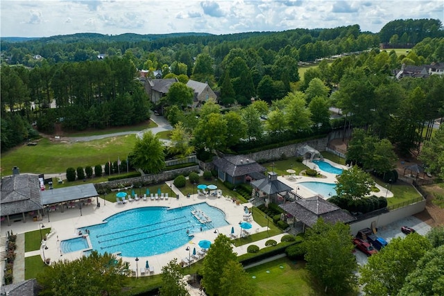 aerial view featuring a view of trees