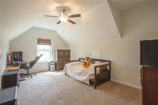 carpeted bedroom with ceiling fan, baseboards, and lofted ceiling