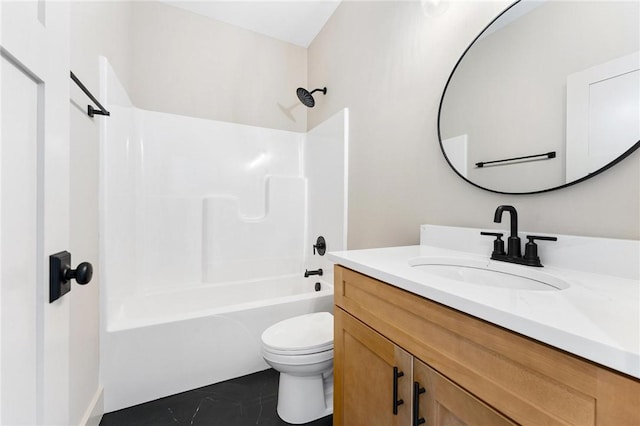 bathroom featuring toilet, bathtub / shower combination, and vanity