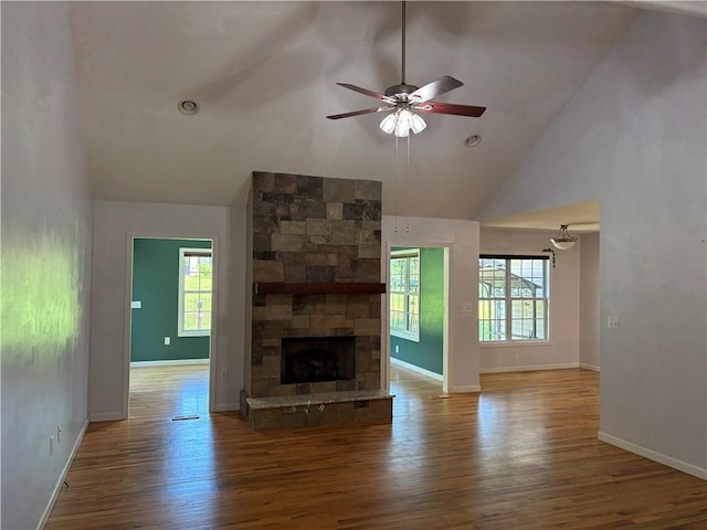 115 Morgan Rd, West Union, SC 29696 - unfurnished living room featuring plenty of natural light, wood finished floors, a ceiling fan, and high vaulted ceiling