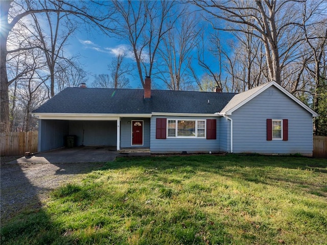 ranch-style home with a carport, roof with shingles, a front yard, fence, and gravel driveway