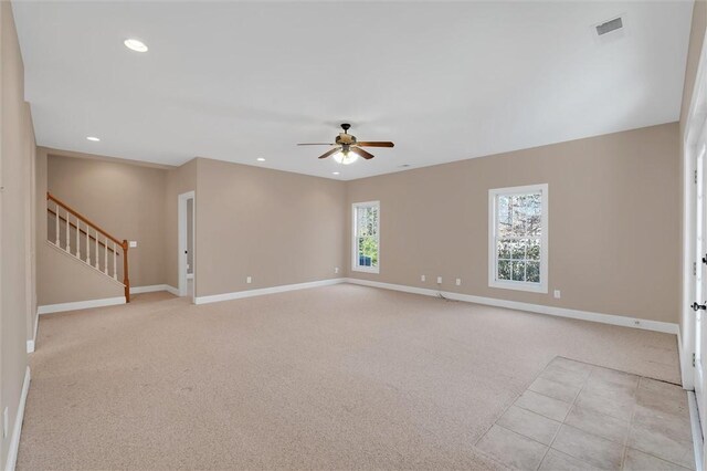 523 Heron Cove Cir, Seneca, SC 29672 - empty room featuring light carpet, baseboards, stairs, a ceiling fan, and recessed lighting