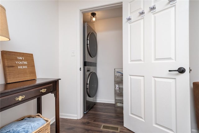 107 Berkley Ave, Greenville, SC 29609 - laundry area featuring baseboards, visible vents, dark wood finished floors, laundry area, and stacked washer / dryer