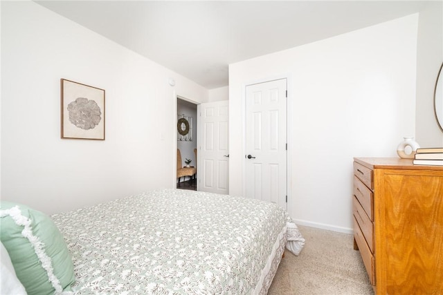 107 Berkley Ave, Greenville, SC 29609 - bedroom with baseboards and light carpet