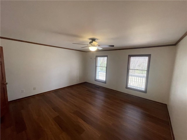 236 Issaqueena Dr, Central, SC 29630 - unfurnished room with ornamental molding, dark wood-style flooring, and ceiling fan
