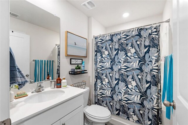 511 Oakmont Valley Trl, Seneca, SC 29678 - full bath with toilet, vanity, a shower with shower curtain, and visible vents