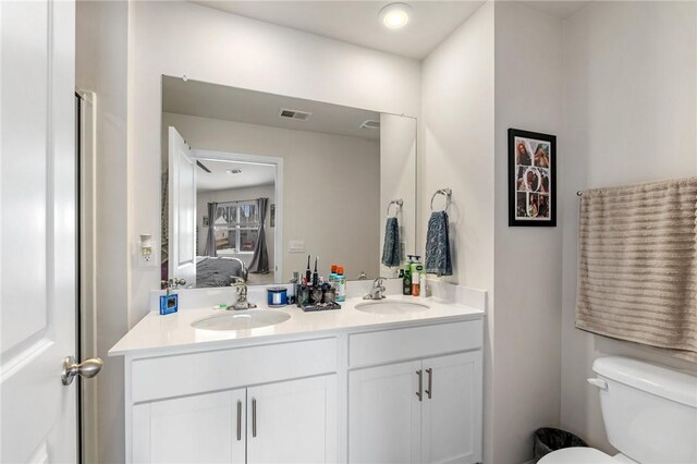 511 Oakmont Valley Trl, Seneca, SC 29678 - ensuite bathroom with toilet, visible vents, a sink, and connected bathroom