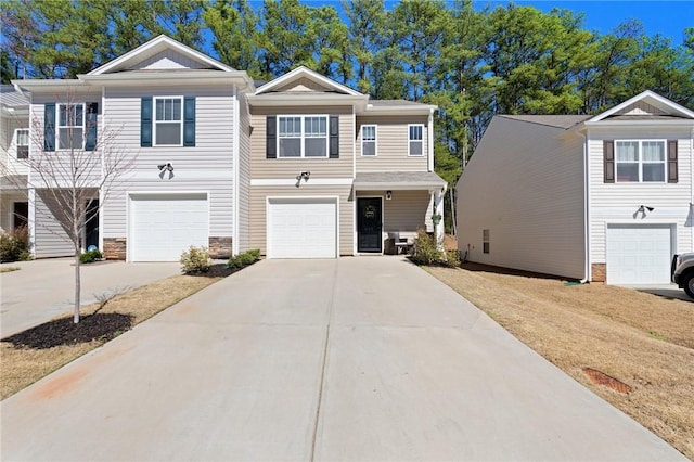 511 Oakmont Valley Trl, Seneca, SC 29678 - view of front of property featuring an attached garage, driveway, and stone siding