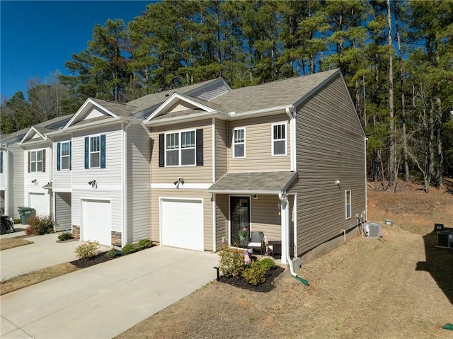511 Oakmont Valley Trl, Seneca, SC 29678 - view of property featuring central AC unit, an attached garage, driveway, and a porch
