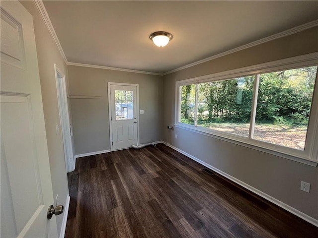 304 Oak Dr, Anderson, SC 29625 - empty room with dark wood-type flooring, baseboards, and crown molding