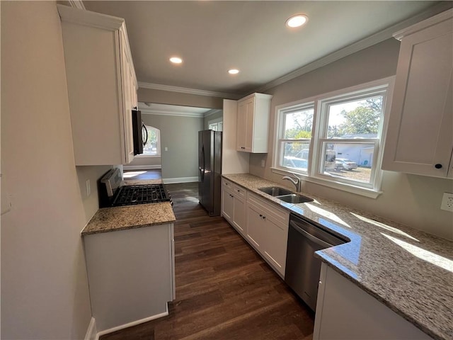 304 Oak Dr, Anderson, SC 29625 - kitchen with ornamental molding, stainless steel appliances, recessed lighting, dark wood-type flooring, and a sink