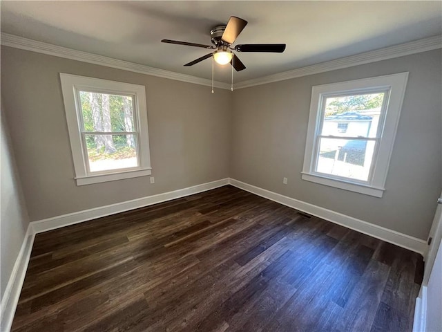 304 Oak Dr, Anderson, SC 29625 - spare room with baseboards, a ceiling fan, ornamental molding, and dark wood-type flooring