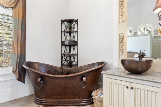 136 Blue Water Trl, Salem, SC 29676 - bathroom featuring vanity, tile patterned floors, and a freestanding bath