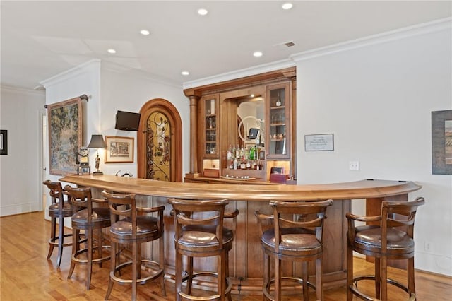 136 Blue Water Trl, Salem, SC 29676 - bar with wet bar, light wood-style flooring, and crown molding