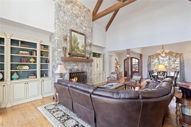 136 Blue Water Trl, Salem, SC 29676 - living area featuring high vaulted ceiling, beam ceiling, a fireplace, light wood-type flooring, and a chandelier