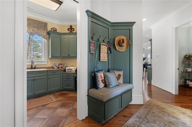 136 Blue Water Trl, Salem, SC 29676 - mudroom with visible vents, a sink, crown molding, light wood finished floors, and baseboards