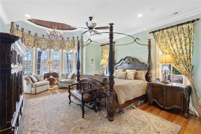 136 Blue Water Trl, Salem, SC 29676 - bedroom with visible vents, a notable chandelier, ornamental molding, wood finished floors, and recessed lighting