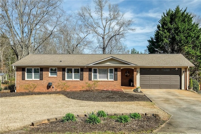 115 Pine Forest Dr, Easley, SC 29642 - ranch-style home featuring concrete driveway, brick siding, a garage, and a shingled roof
