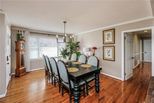 115 Pine Forest Dr, Easley, SC 29642 - dining room featuring wood finished floors, baseboards, and ornamental molding