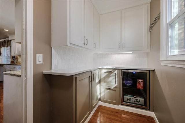 115 Pine Forest Dr, Easley, SC 29642 - bar with wine cooler, dark wood-style floors, and backsplash