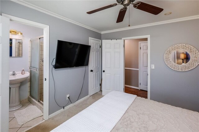 115 Pine Forest Dr, Easley, SC 29642 - bedroom with ornamental molding, ensuite bathroom, a ceiling fan, a sink, and baseboards