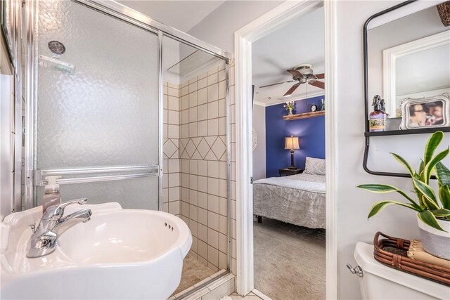 115 Pine Forest Dr, Easley, SC 29642 - full bathroom featuring connected bathroom, a shower stall, ceiling fan, toilet, and a sink