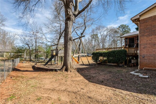 115 Pine Forest Dr, Easley, SC 29642 - view of yard featuring a wooden deck, fence, and a playground