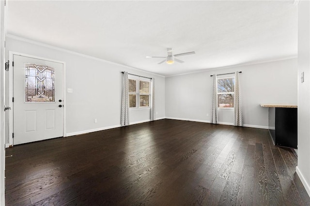 unfurnished living room with a wealth of natural light, ceiling fan, and wood finished floors