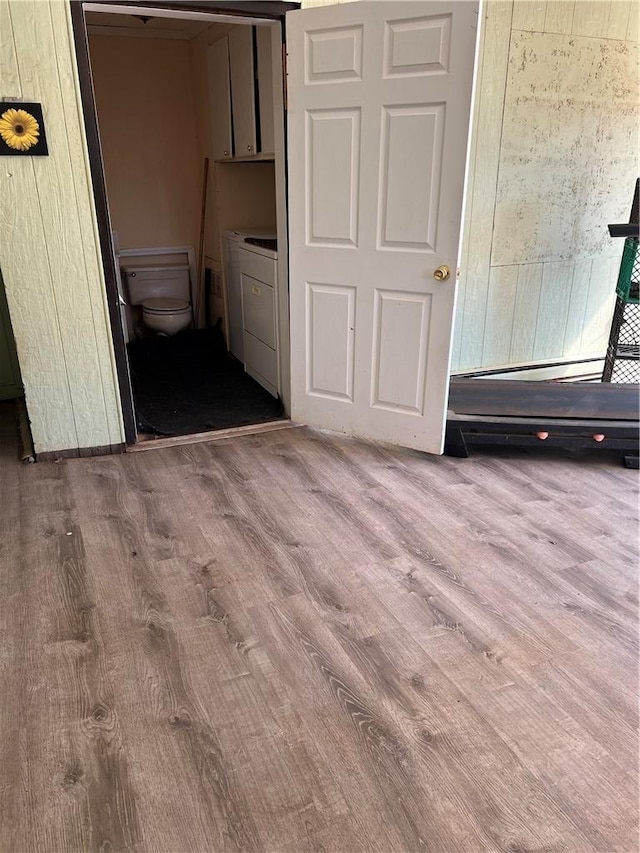 125 Victorian Dr, Anderson, SC 29625 - unfurnished bedroom featuring wood finished floors and washing machine and clothes dryer