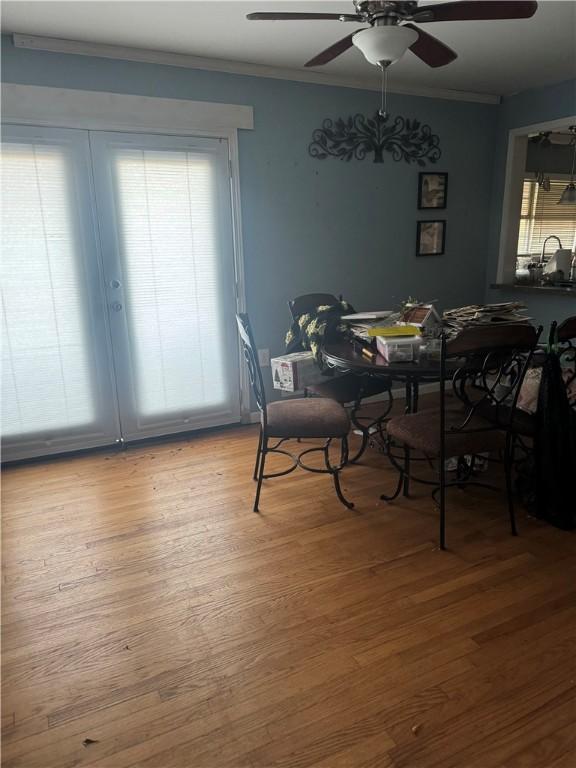 1010 Bern Cir, Anderson, SC 29625 - dining area featuring crown molding, light wood-style floors, and ceiling fan