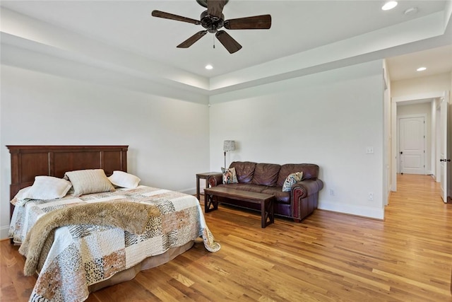bedroom featuring baseboards, recessed lighting, ceiling fan, and light wood finished floors