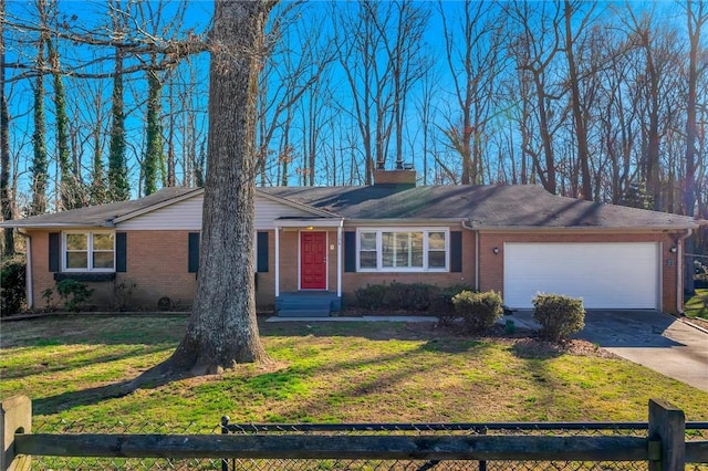 106 Clark Ave, Greer, SC 29651 - single story home with brick siding, a front lawn, fence, and an attached garage