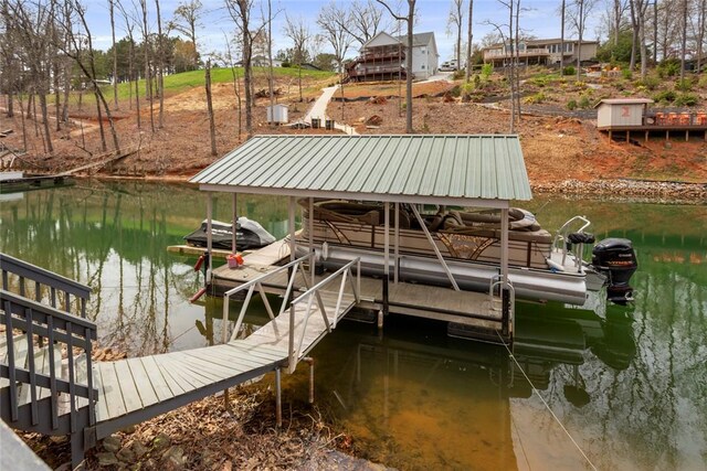 view of dock with a water view