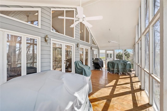 sunroom with ceiling fan and french doors