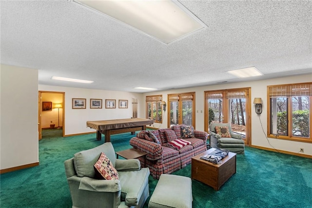 living area featuring pool table, carpet floors, baseboards, and a healthy amount of sunlight