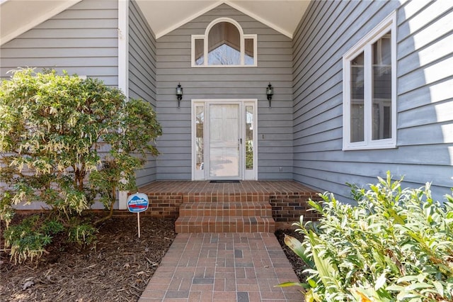 doorway to property with a porch