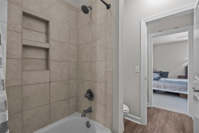 324 Crestgate Way, Easley, SC 29642 - ensuite bathroom with wood finished floors, toilet, shower / bathtub combination with curtain, and baseboards