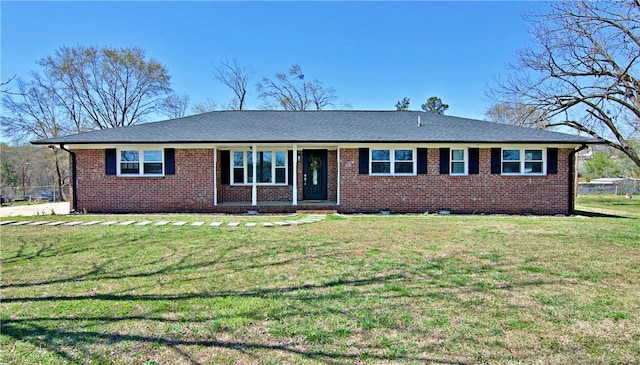 single story home featuring brick siding and a front lawn