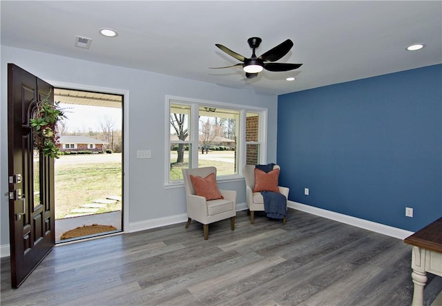 sitting room with wood finished floors, baseboards, visible vents, ceiling fan, and recessed lighting