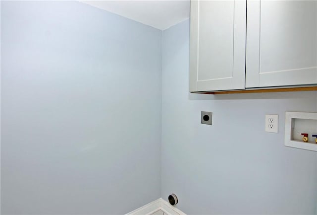 laundry room featuring baseboards, cabinet space, hookup for an electric dryer, and hookup for a washing machine