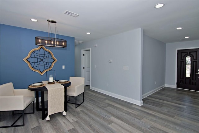 dining space with visible vents, baseboards, recessed lighting, and wood finished floors