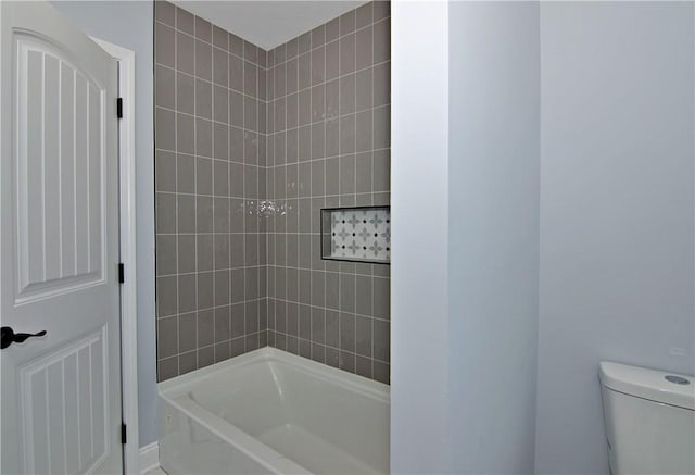 full bath with toilet and  shower combination