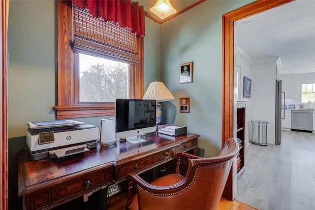 home office featuring crown molding and light wood-style floors